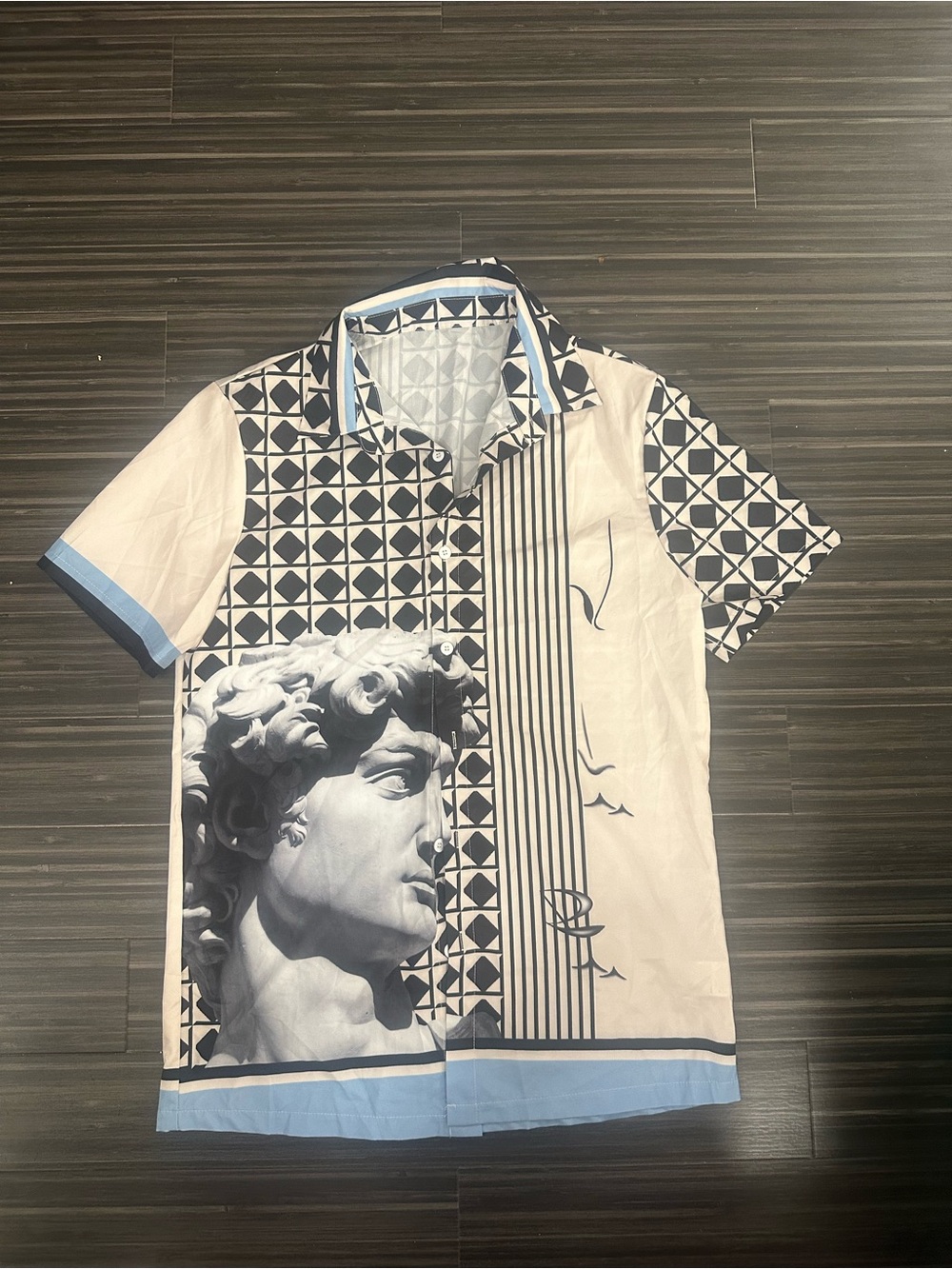 Unisex Short Sleeve Art-Print Shirt in Cream and Black with Blue Trim